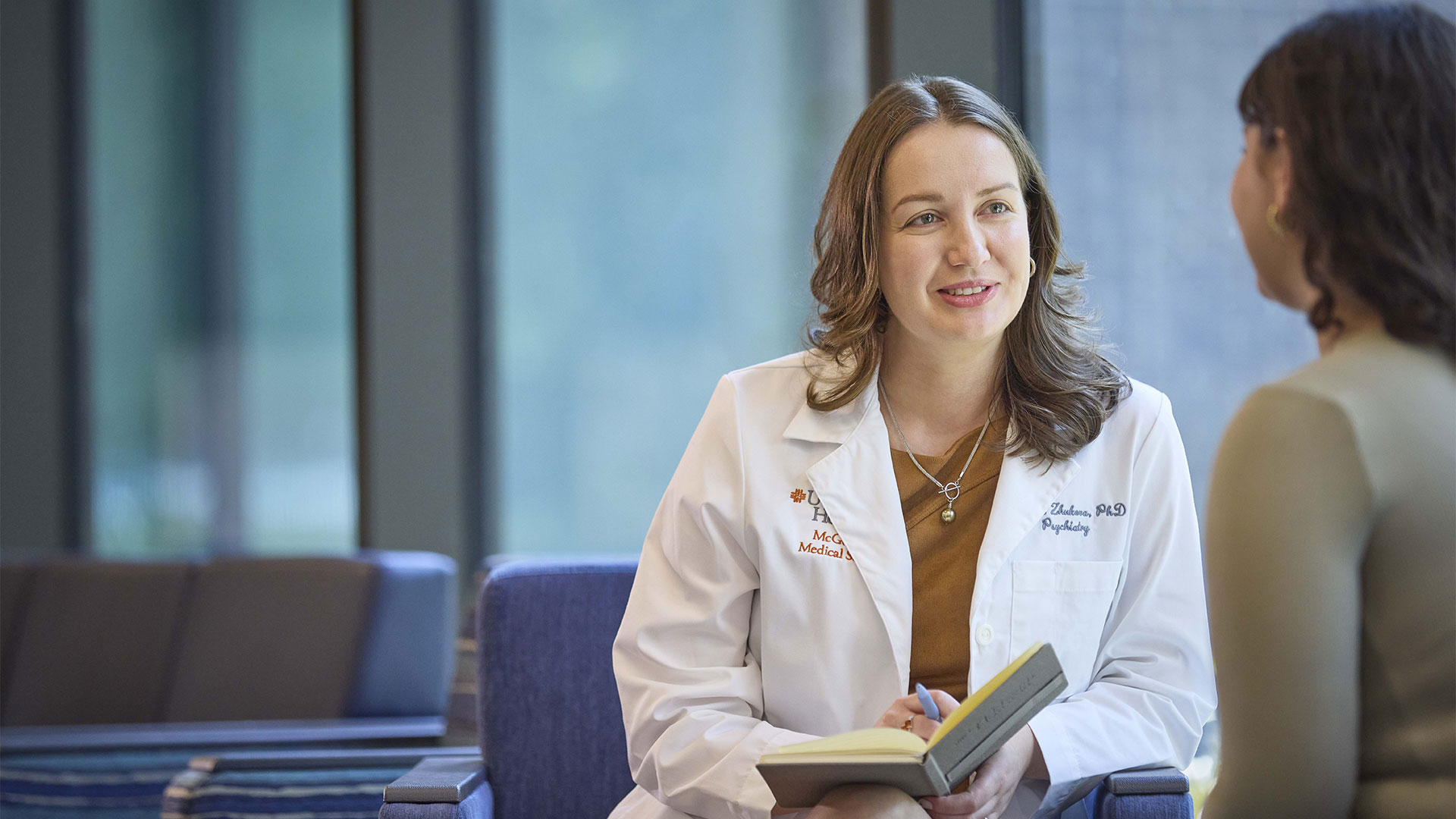Female doctor looking at patient